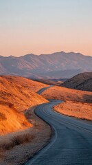 Fototapeta premium Winding Road Through Desert Landscape At Sunset. Serene Journey In Nature'S Tranquility