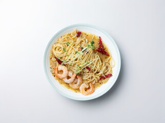 Oil pasta with shrimp on a plate
