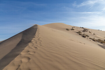 Singing Dune in the Altyn-Emel (or Altyn Emel) national park. Zhetysu region, Kazakhstan.