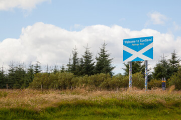 Roadside Border Sign Marking the Crossing from England into Scotland - "Welcome to Scotland"