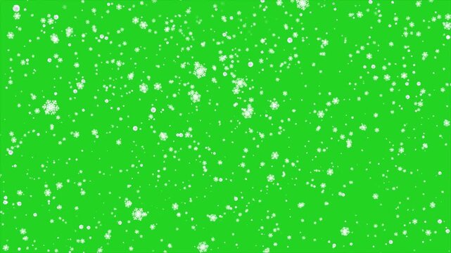 Winter snow flake falling on green screen