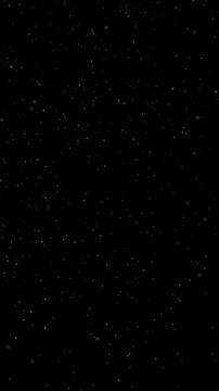 Falling snowflake, isolated on black background and green screen. 9:16 ratio 4k high quality.	
