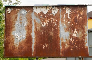 Old rusty weathered billboard sign 