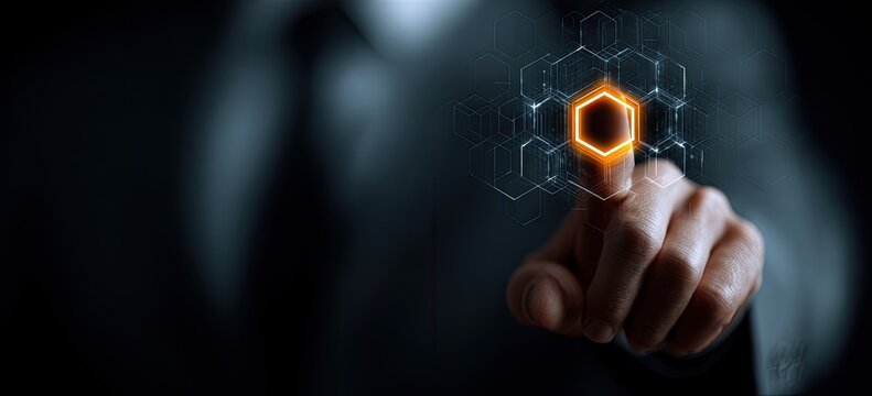 A person in a suit interacting with a digital interface. The central hexagon glows