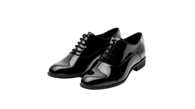 Black patent leather dress shoes gleam in studio lighting. Ideal for product photography or branding materials.