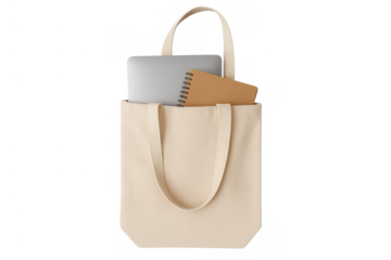 Canvas tote bag carrying laptop and brown spiral notebook, demonstrating reusable and eco-friendly daily carry