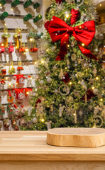 Holiday Cheer Showcase: A festive Christmas tree adorned with glittering ornaments and a vibrant red bow is ready to showcase products, the scene filled with holiday cheer.