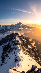 A breathtaking mountain range bathed in the warm glow of the rising sun. Peaks pierce the clouds; a stunning aerial view