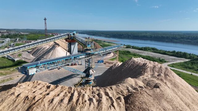 Drying and storage of wood chips in piles. General view of the paper mill. Paper production