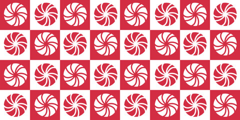 Seamless pattern with round striped candy silhouettes on  red white geometric composition of squares. Ideal for holiday packaging, textile prints, wrapping paper and cheerful festive designs