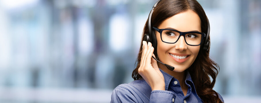 Representative call center. Businesswoman woman callcenter support phone operator in headset, glasses. Customer service help. Sales agent. Banner image with free  text space. Blurred office background