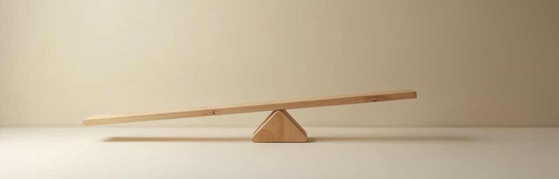 Simple wooden lever rests on triangular fulcrum. Shows basic physics, balance, weight, and force concepts. Clean background for educational or conceptual use.