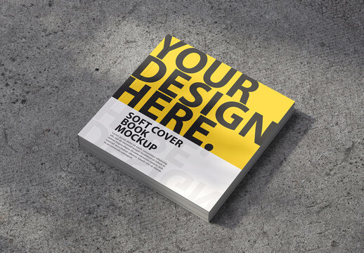 Square Soft Cover Book Mockup on concrete table