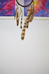 Dream catcher with feathers threads and beads rope hanging. Dreamcatcher handmade