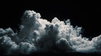Dramatic billowing white and grey smoke cloud from an explosion isolated on a black background.