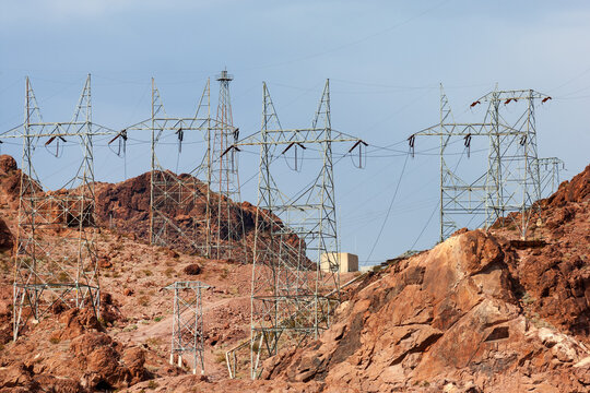 Pylons supporting the high-voltage power lines to transmit electricity generated by the Hoover Dam power plant, Arizona, Southwest USA