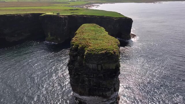 Downpatrick Head in Ireland at Sunny Day, Aerial Drone Shot. Stunning High Cliffs, Dun Briste Irish Coastal Landmark.