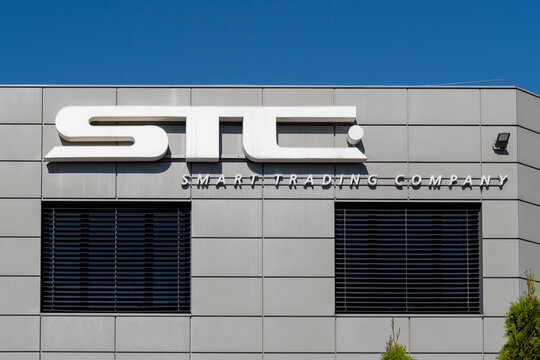Jawczyce, Poland - September 21, 2025: STC (Smart Trading Company) logo on building exterior
