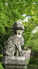 The old stone sculpture in the old temple of the Japan
