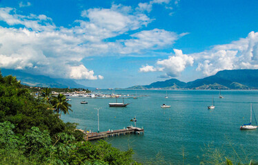 Tropical Beach with Golden Sand and Palm Trees in Ilhabela, Brazil