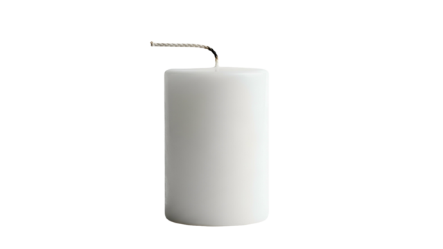 A thick, cylindrical white candle with a lit wick against a stark black background