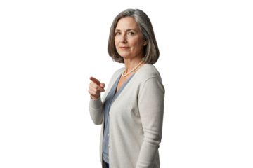 Isolated confident senior businesswoman pointing forward with leadership authority