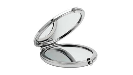 Open, silver-colored compact mirror reflecting light against a black background