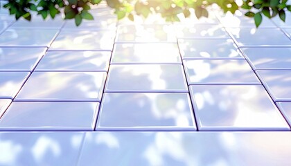 A close-up, low-angle view of a grid of shiny, light-colored tiles. Sunlight streams down from above, casting dappled shadows of green leaves onto the tiled sur
