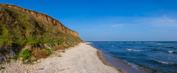 Landscape with the wild coastal area (beach) at the Black Sea in Vama Veche, Constanta County -...