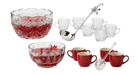 Elegant glass punch bowls with red liquid, clear and red ceramic mugs, and silver ladles, perfect for festive beverages, isolated on transparent background