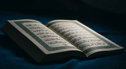 Fototapeta premium Open Quran Book with Islamic Calligraphy