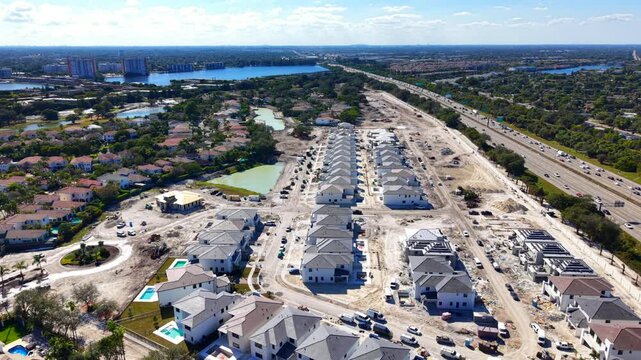 Aerial drone video homes under construction Ojus Miami Florida 2025