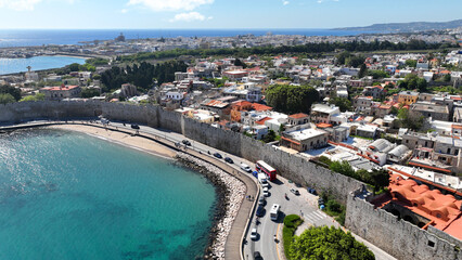Obraz premium Aerial drone photo of popular for tourists Medieval fortified old town of Rhodes island featuring nice restaurants and ancient sites an Unesco World Heritage, Dodecanese, Greece
