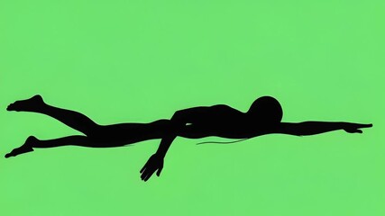 Silhouette of a swimmer in a green background, swimming freestyle.