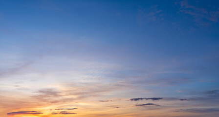 Abstract sunrise gold and blue sky as background