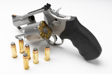 Revolver gun and .44 bullets on white background , Classic handgun