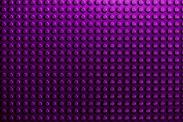 Obraz premium Purple background of the LEGO Classic baseplate