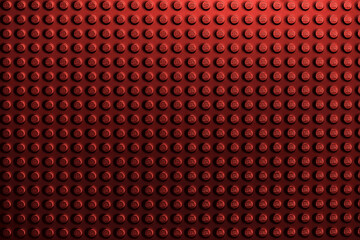 Naklejka premium Red background of the LEGO Classic baseplate