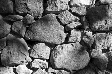 Masonry stone wall texture, no binding plaster, background.