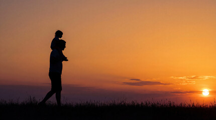 Fototapeta premium Father and Child Silhouette Walking at Sunset