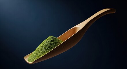 Finely ground green tea powder is presented in a traditional light wood scoop, captured with soft, focused lighting in a sophisticated and minimalist still life composition