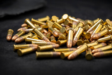 Close up of .22 ammunition on black background , .22 LR bullets