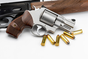 .44 magnum revolver handgun and lever action rifle on white background