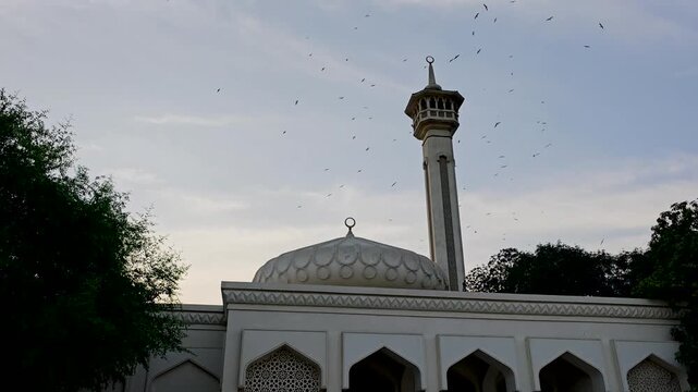 Al Farooq Mosque in Al Fahidi historical neighbourhood, also known as Al Bastakiya during a sunset. 4K video footage