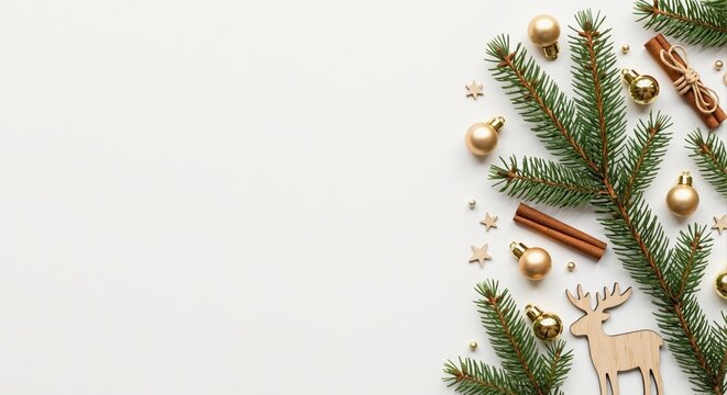 Christmas flat lay background with fir branches and rustic decorations. Festive holiday composition with gold ornaments and a wooden reindeer. Top view with copy space for text