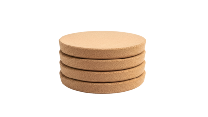 A stack of four circular, light brown coasters with a textured surface on a black background