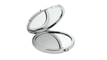 A silver, open compact mirror, reflecting light against a black backdrop