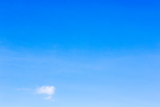 little white cloud in blue sky on sunny autumn day