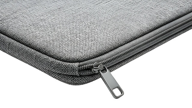 Close-up of a gray laptop sleeve with a silver zipper partially opened, isolated on black