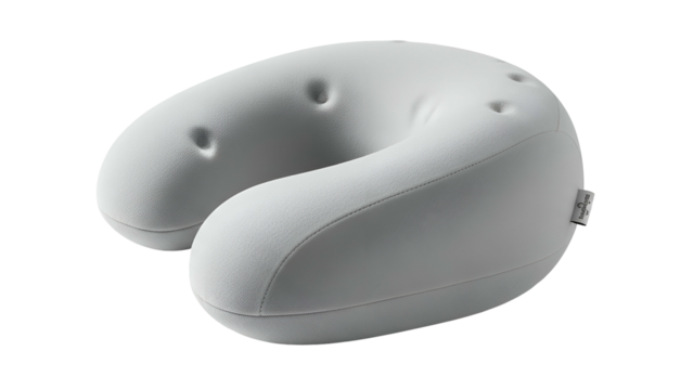 A light grey, U-shaped travel pillow with indented top and slightly textured fabric